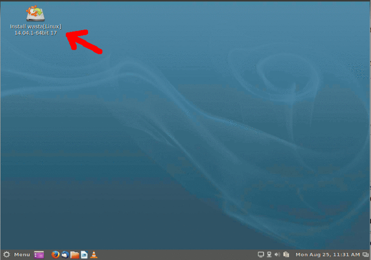 The Wasta Linux Desktop showing with the Install icon (red arrow)